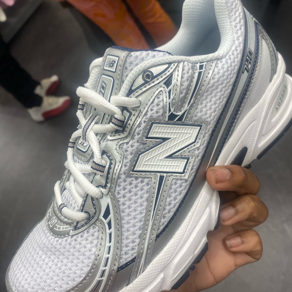 New Balance White and Black Athletic Shoes